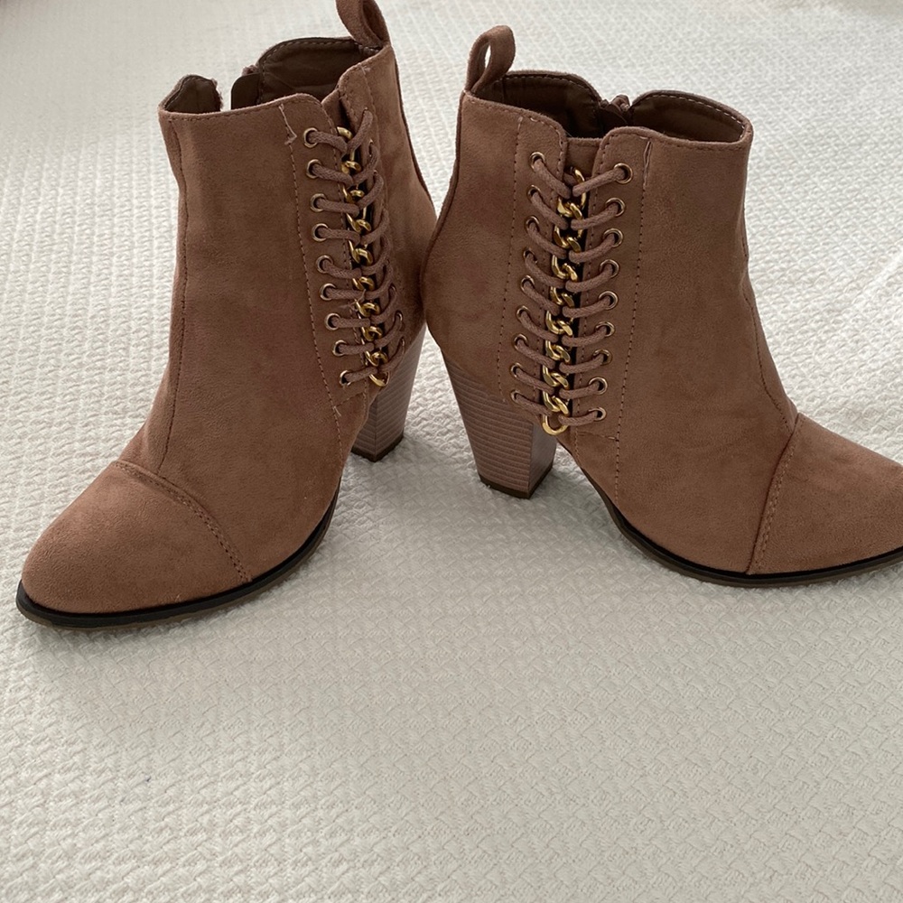 Pink micro suede booties with gold detail . Barely worn. Side zipper.